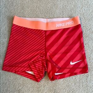 Nike Pro Pink and Red Striped Shorts